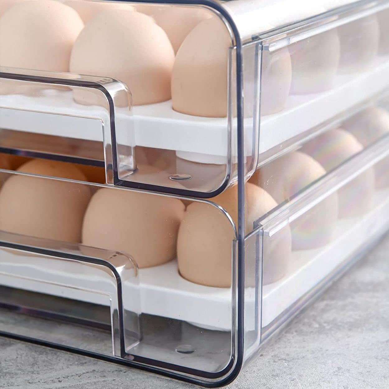 Raxiva-egg container holder in fridge